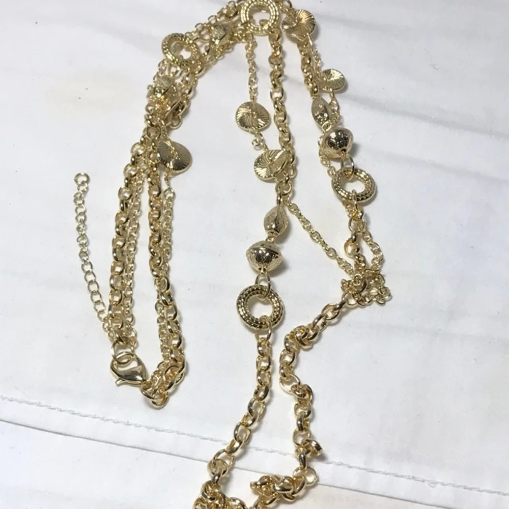 Shiny gold tone necklace/ double strands in very good pre-owned condition